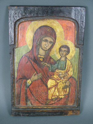 A 19th century Russian primitive icon depicting the Virgin of