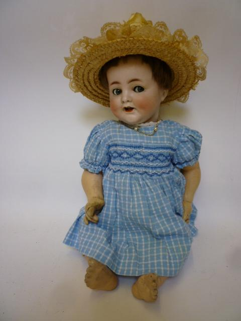 An Alt Beck Gottschalcke bisque head girl character doll with