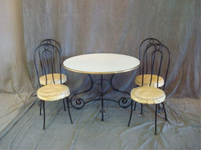 Neoclassical Style Metal Dinette Set Has 6 chairs and a