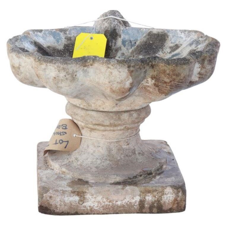 Cast stone shell form bird bath 20th c rising on