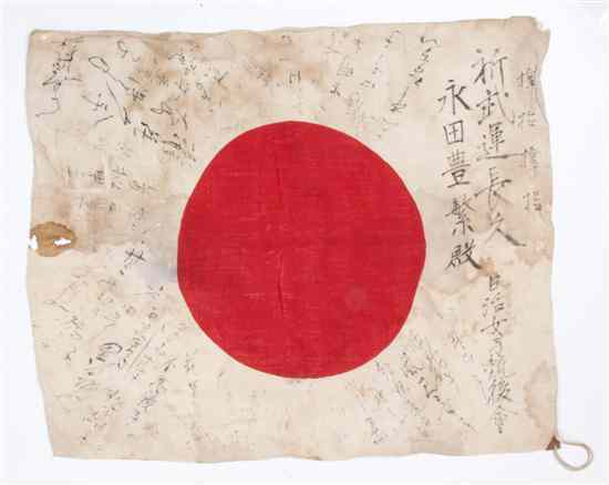 A Japanese World War II Flag bearing soldiers signatures together