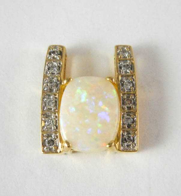 OPAL AND FOURTEEN KARAT GOLD SLIDE PENDANT with six round
