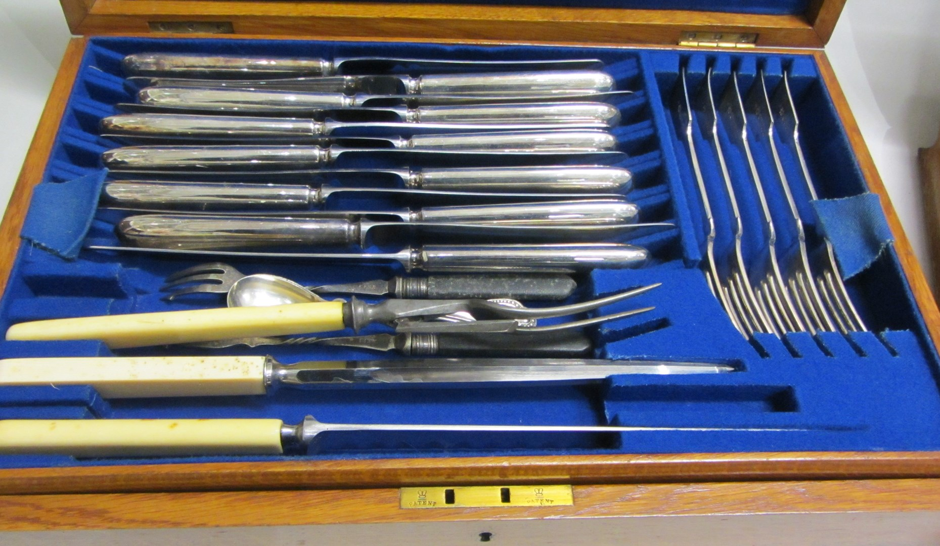 Plated fiddle pattern table flatware comprising twelve table forks twelve