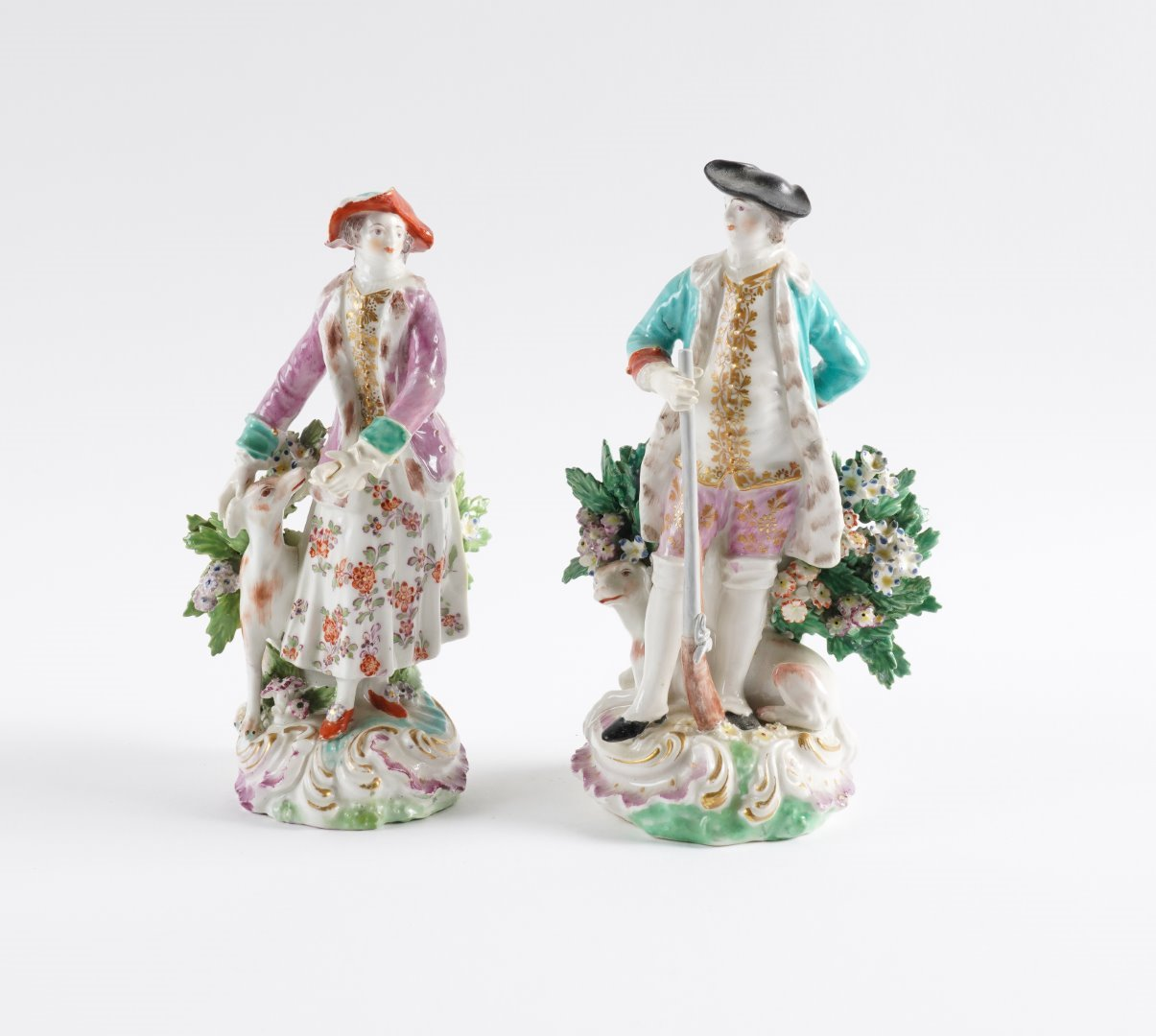 A MATCHED PAIR OF DERBY FIGURES OF A HUNTSMAN AND