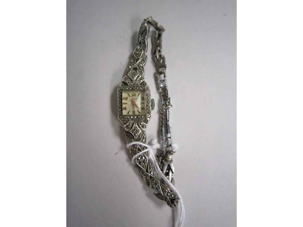 A Swiss Dress Watch with engine turned square dial the