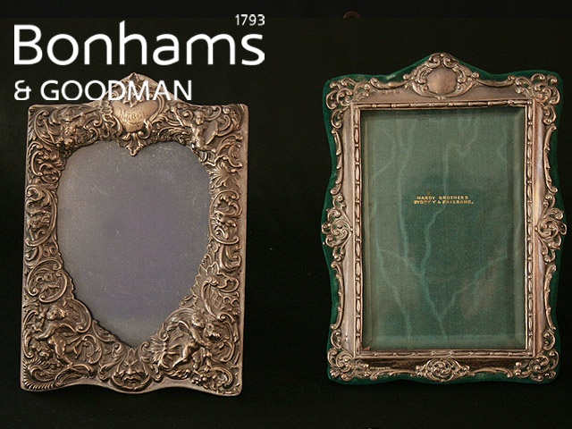 A Sterling silver photograph frame of shaped rectangular form with