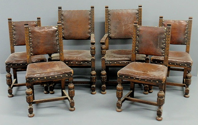 Set of six Jacobean style oak and leather chairs two