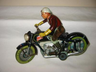 An Arnold MAC70 motor cyclist marked U S Zone tin