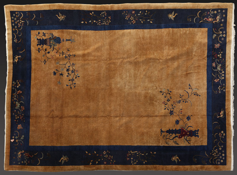 A large Chinese Peking Art Deco woolen carpet rug A