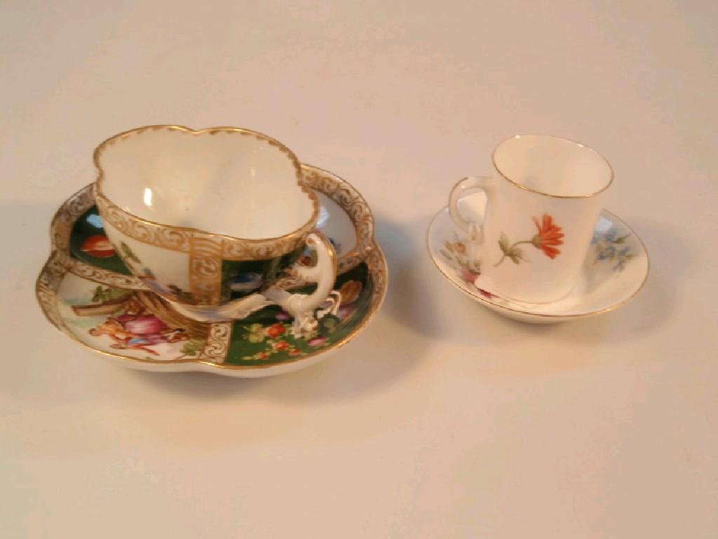 A Helena Wolfsohn porcelain cabinet cup and saucer of quatrelobed