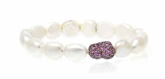 An 18 Karat White Gold Cultured Freshwater Pearl and Sapphire