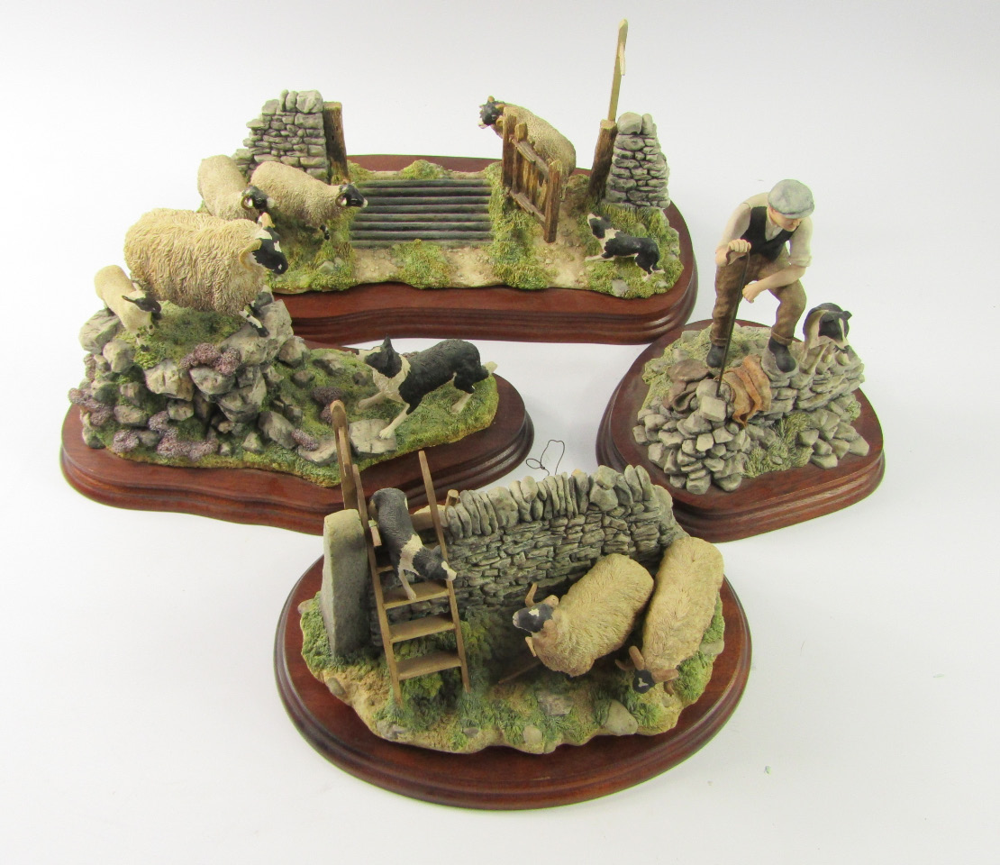 Four Border Fine Arts sheep group models all with wooden