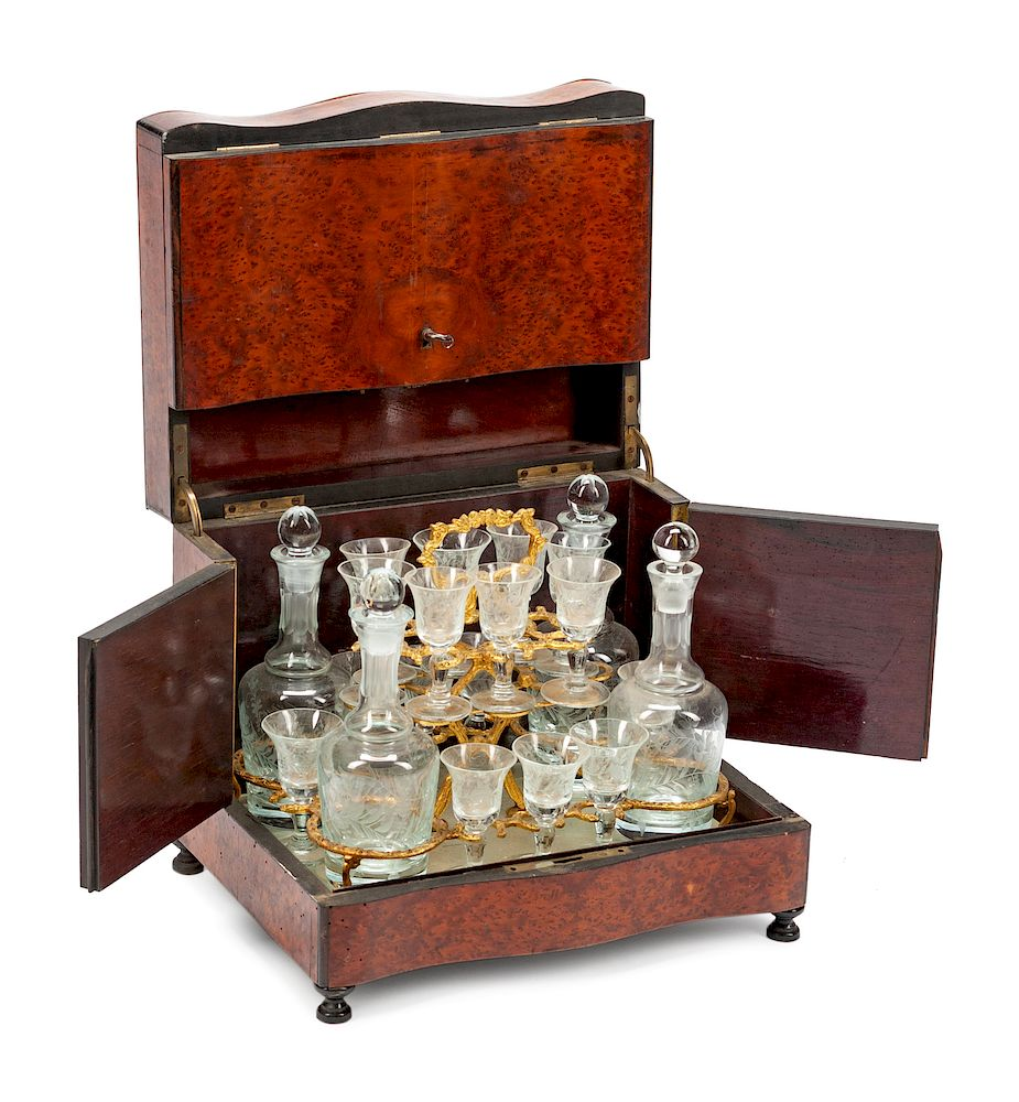 A Napoleon III Ebonized Brass and Mother of Pearl Inlaid