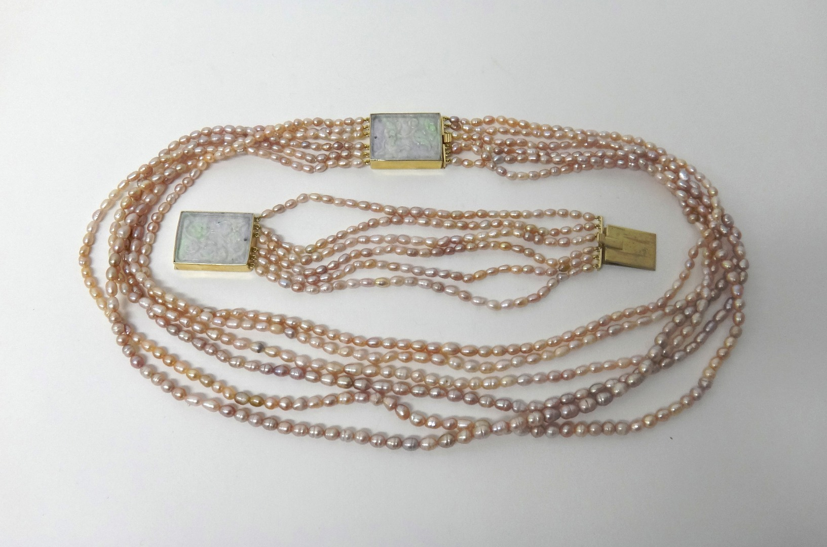 A six row necklace of pink tinted freshwater cultured pearls