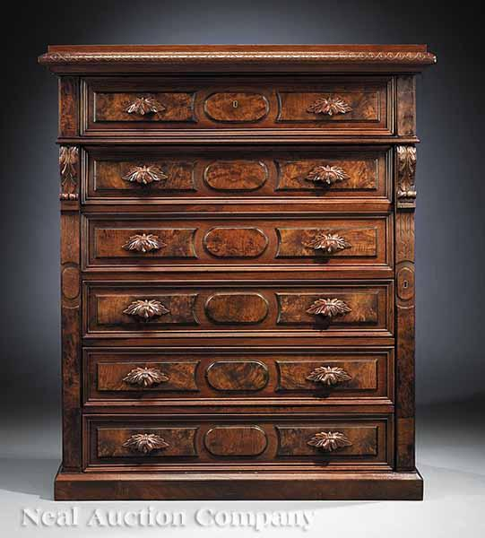 An American Renaissance Carved and Burled Walnut Chest of Drawers