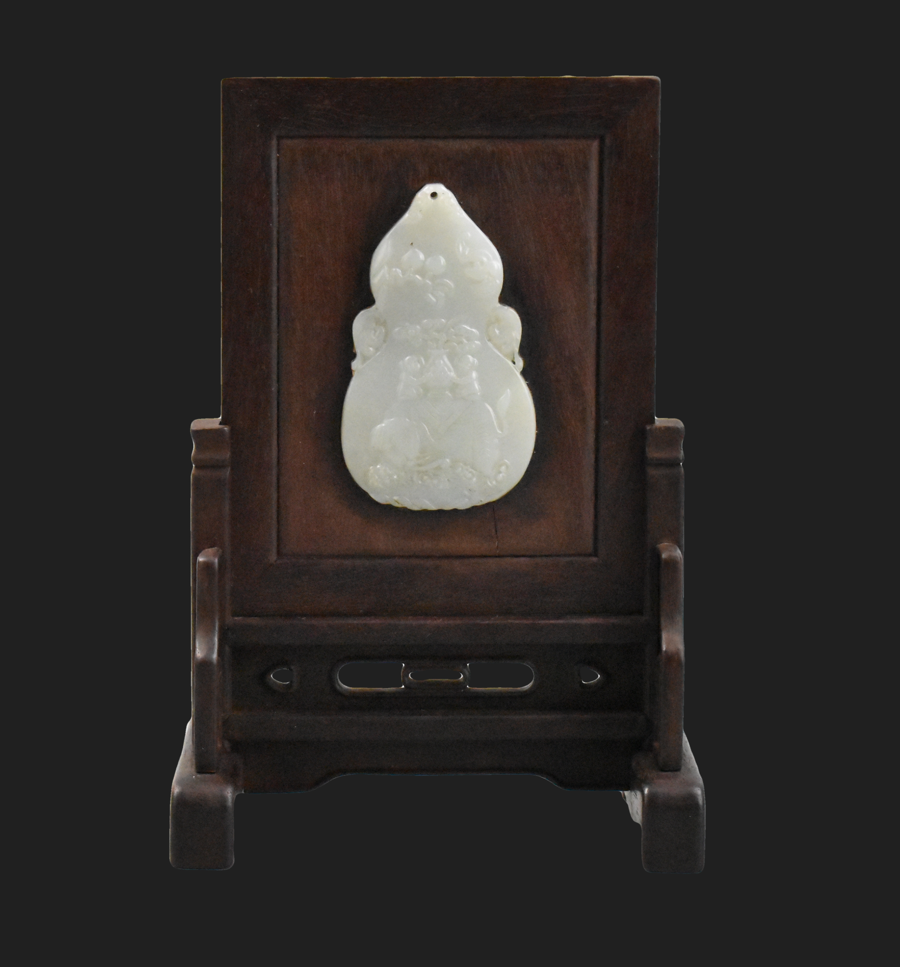 A Chinese table screen inlaid with a jade carving The