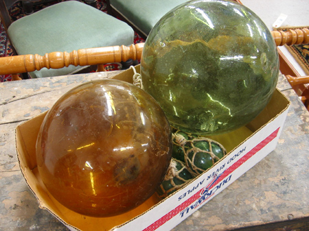 A GROUP OF COLORED GLASS FISHING FLOATS 7 total Two