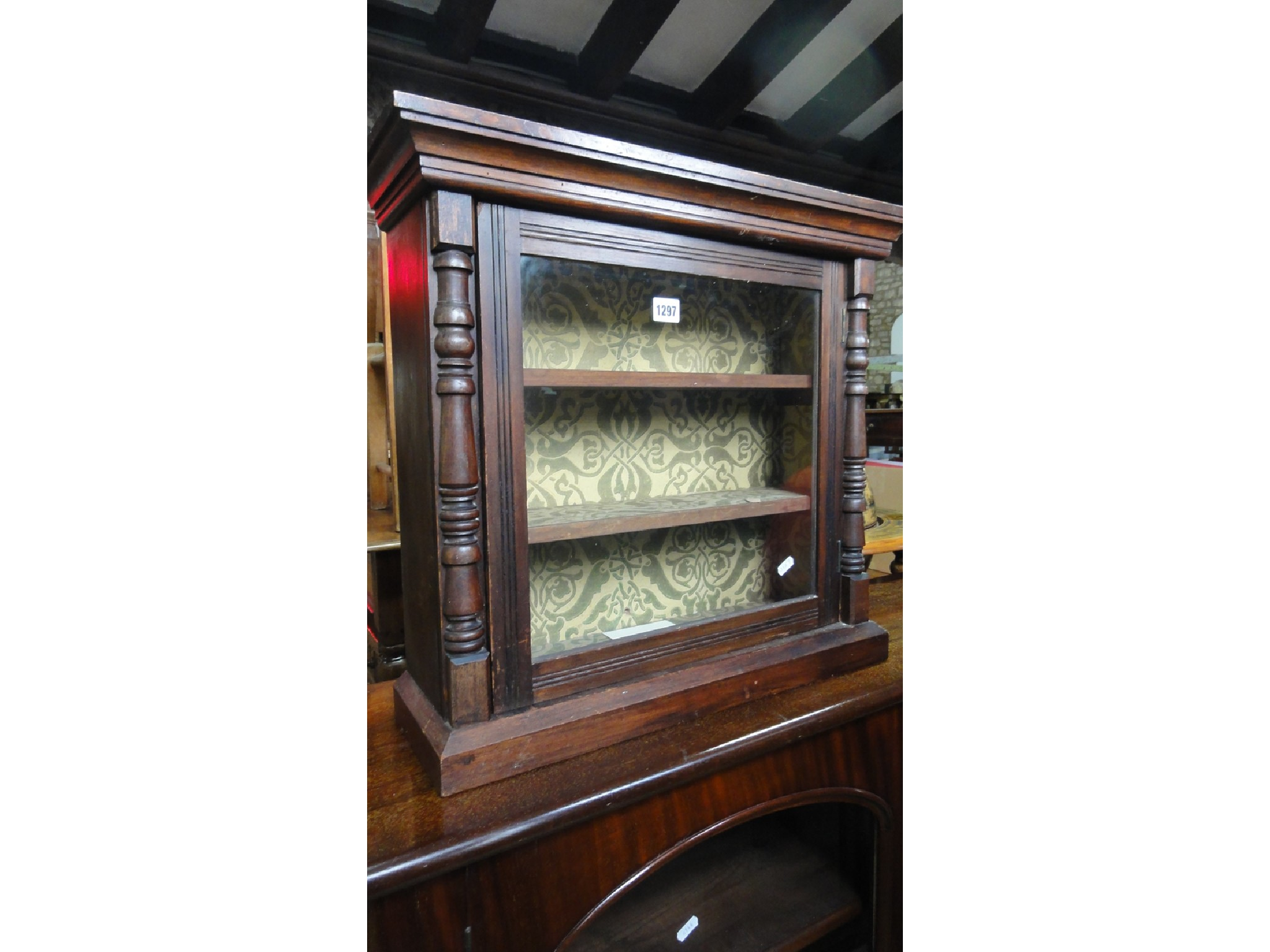 A small vintage wall mounted table top display cabinet the