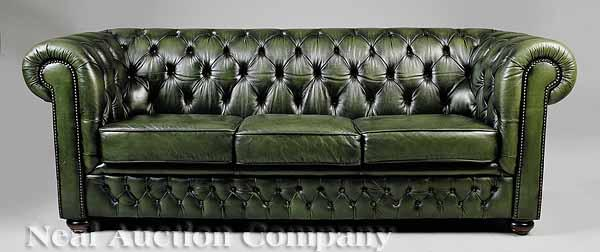 A Chesterfield Sofa of typical form upholstered in green leather