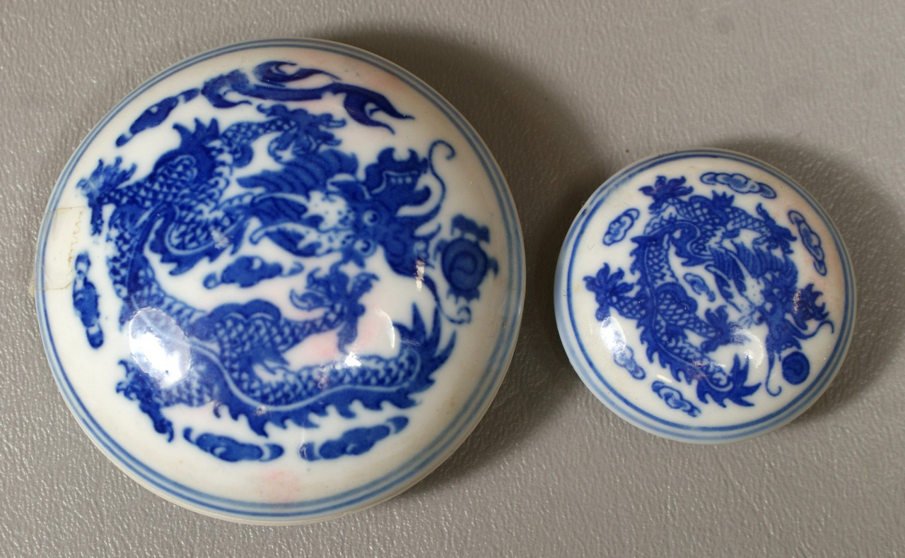 2 blue and white dragon decorated Chinese porcelain paste boxes