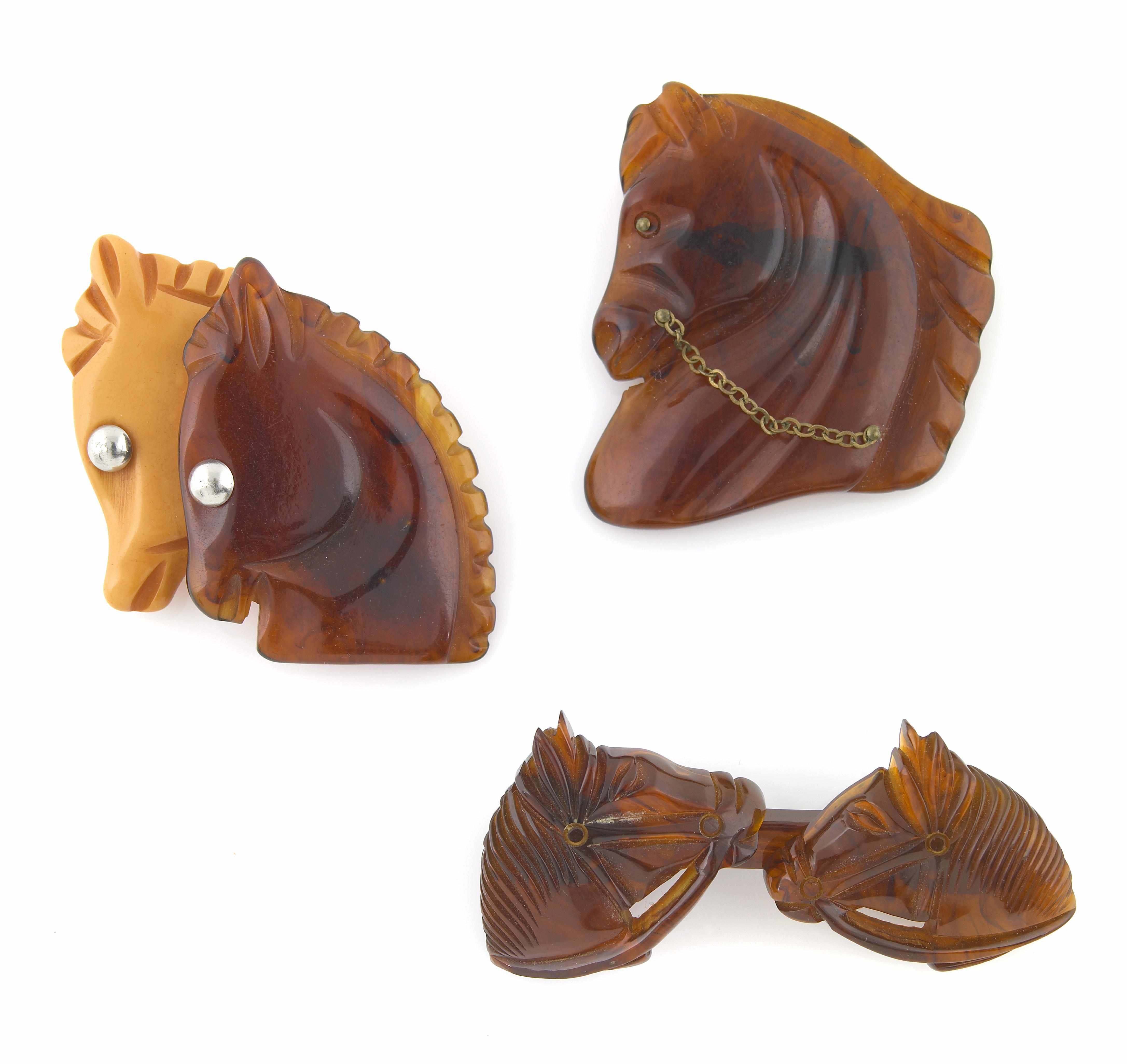 Three rootbeer Bakelite horse brooches one with butterscotch dimensions 3