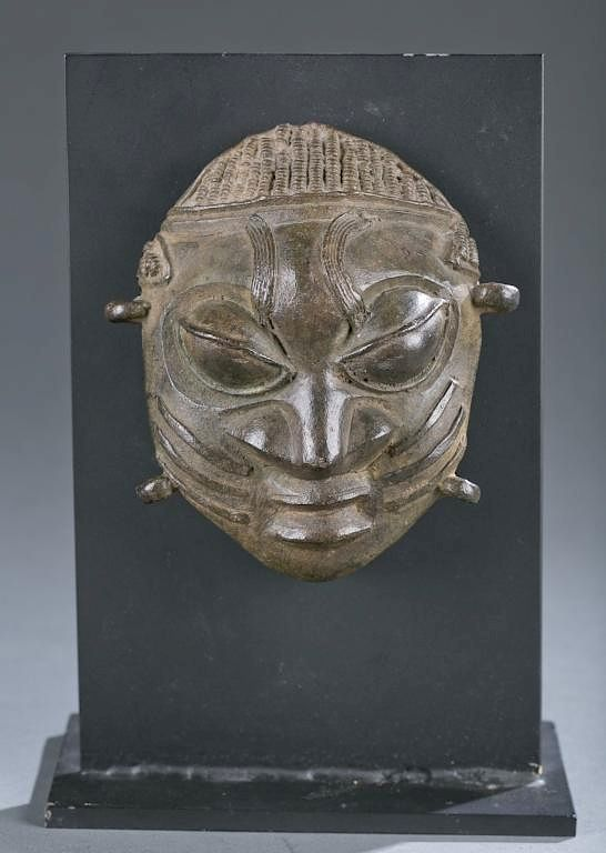 Brass bronze maskette A brass bronze maskette Nigeria Ijebu 18th