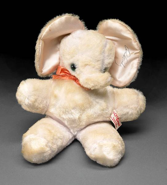 An Elvis Presley signed stuffed elephant 1970 A small white