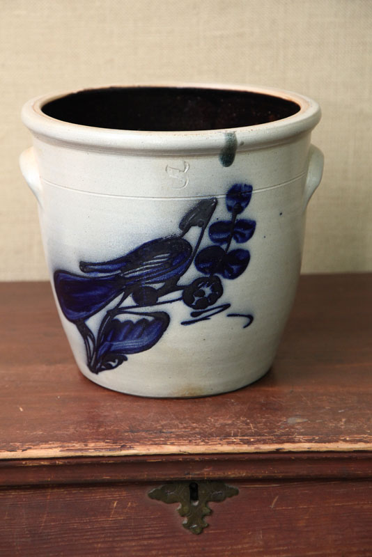 STONEWARE CROCK With applied handles and cobalt bird design Impressed