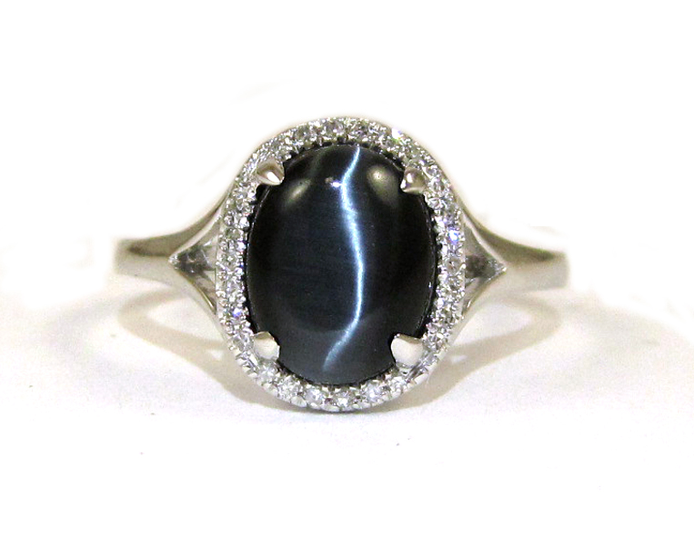 CAT S EYE AND FOURTEEN KARAT WHITE GOLD RING with