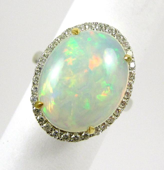 OPAL DIAMOND AND FOURTEEN KARAT GOLD RING The white gold