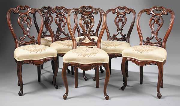 A Set of Eight Rococo Revival Walnut Dining Chairs 19th