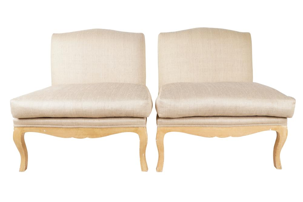 PAIR OF KREISS OVERSIZED PULL UP CHAIRScovered with natural colored