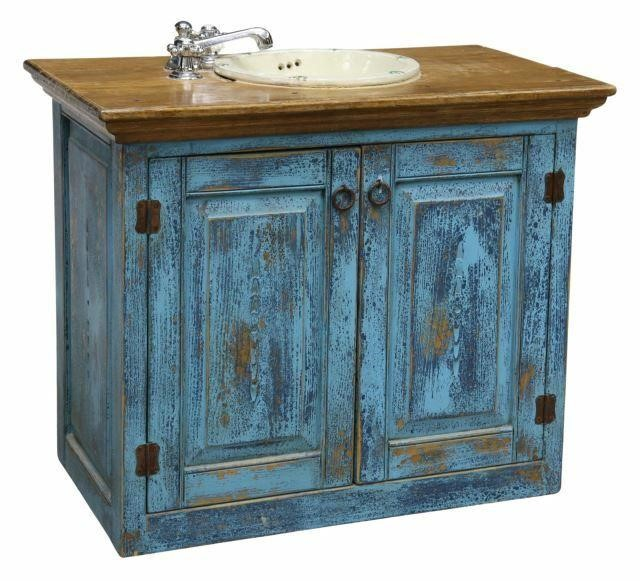 Rustic cabinet vanity Mexico 20th c fitted with a pottery