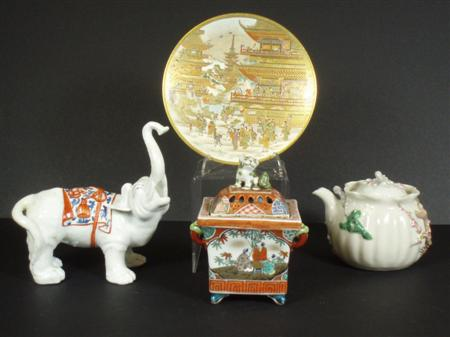 A Japanese satsuma plate circa 1900 decorated with figures and