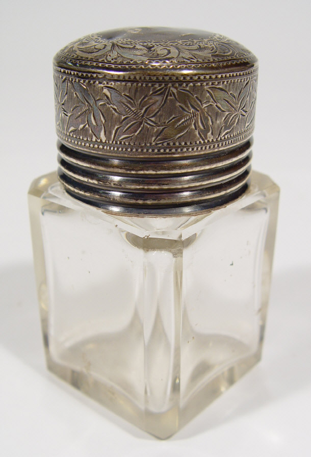 Edwardian square cut glass bottle and stopper with silver screw