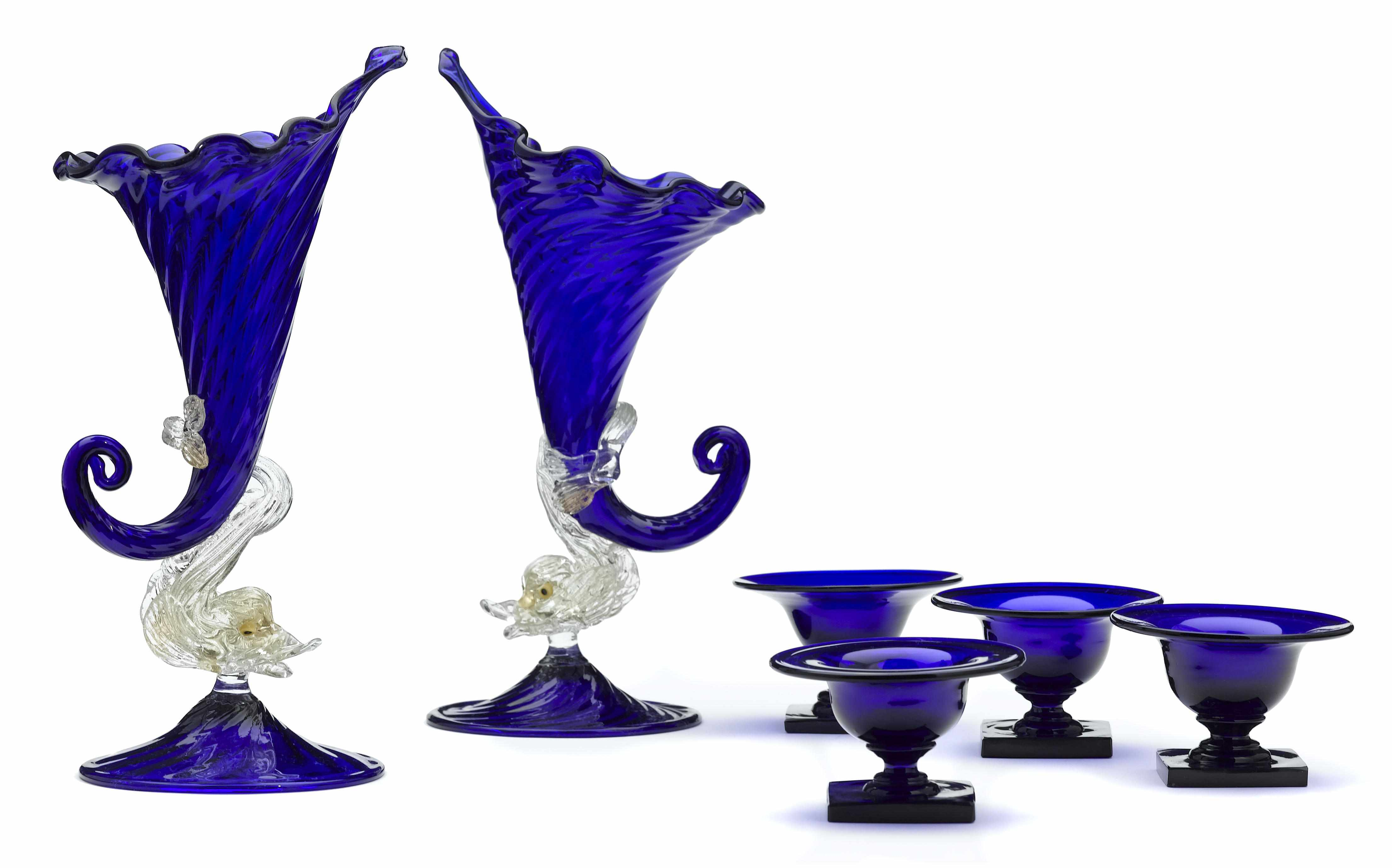 A pair of Italian glass vases and four blue glass