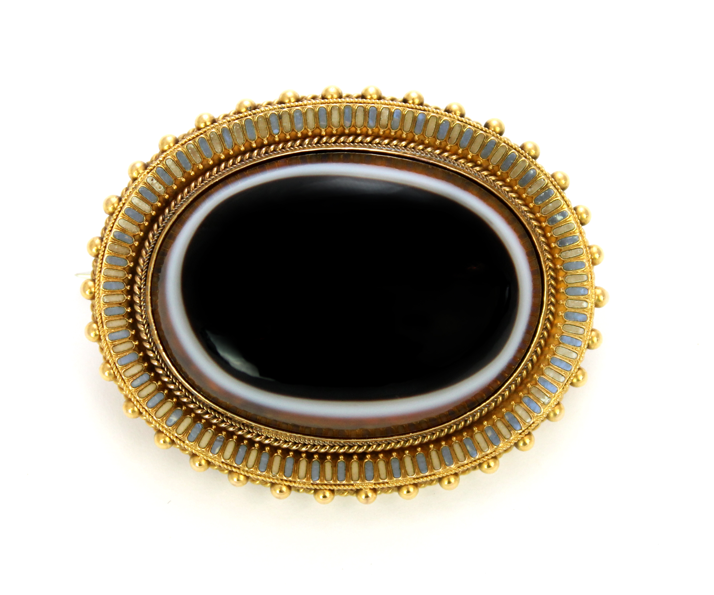 A Victorian gold enamelled and agate set oval brooch mounted