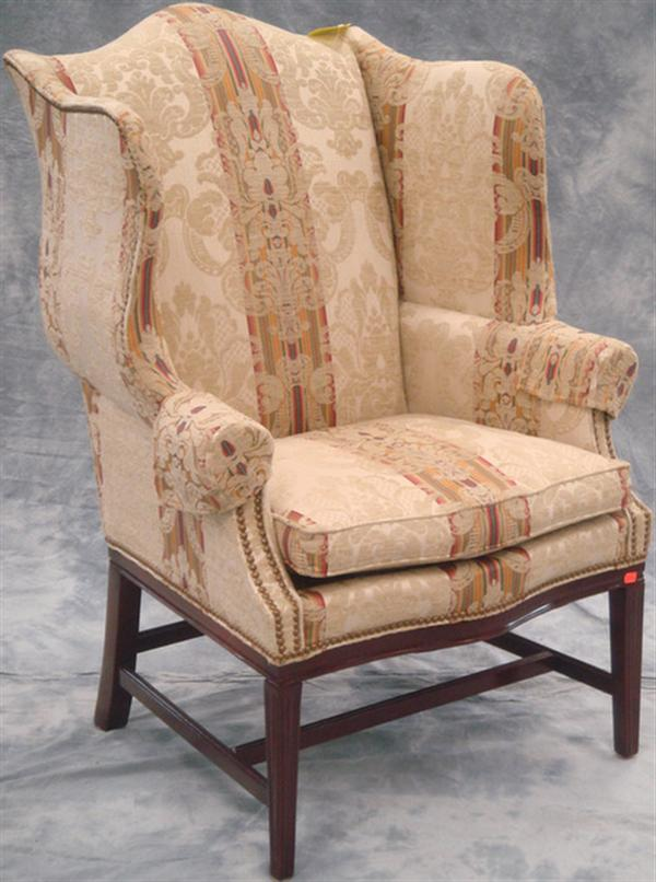 Hepplewhite style wing chair by Hancock Moore 46 h Estimate