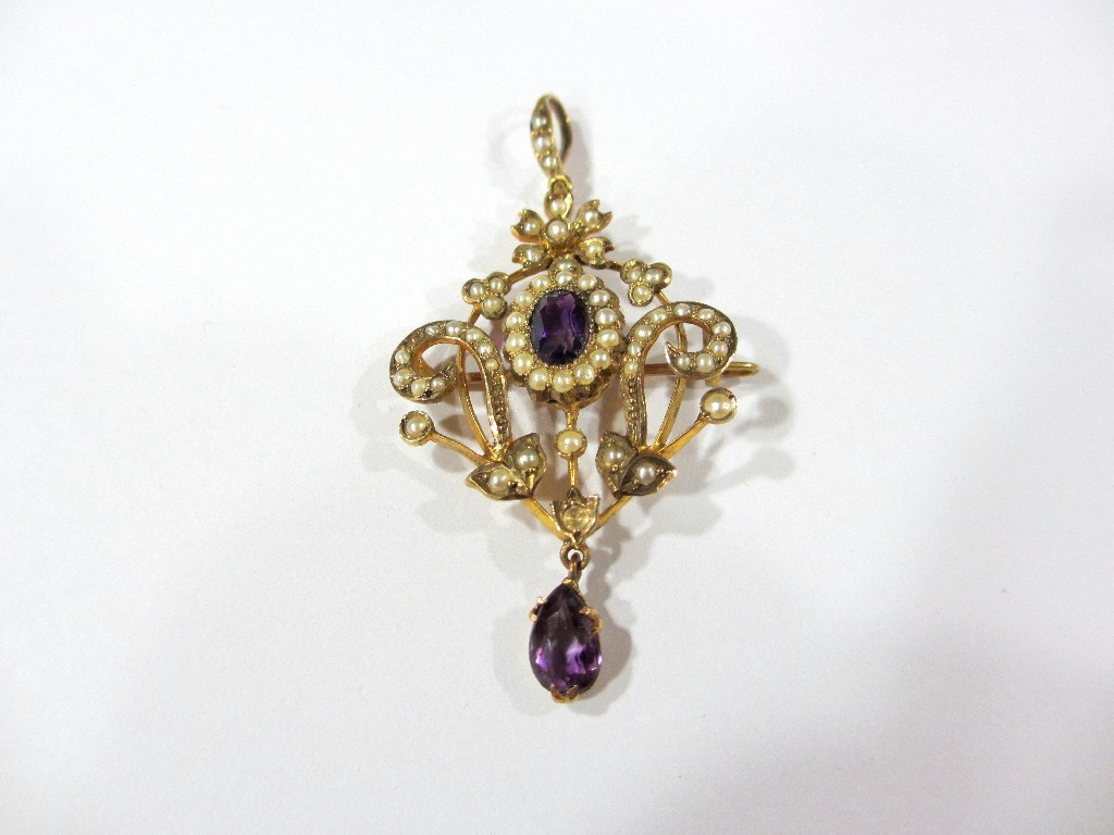 A pretty Victorian 9ct gold pendant open foliate scroll design