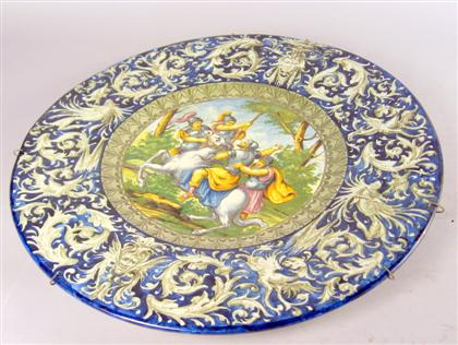 Italian maiolica charger Centrally painted with a classical scene enclosed