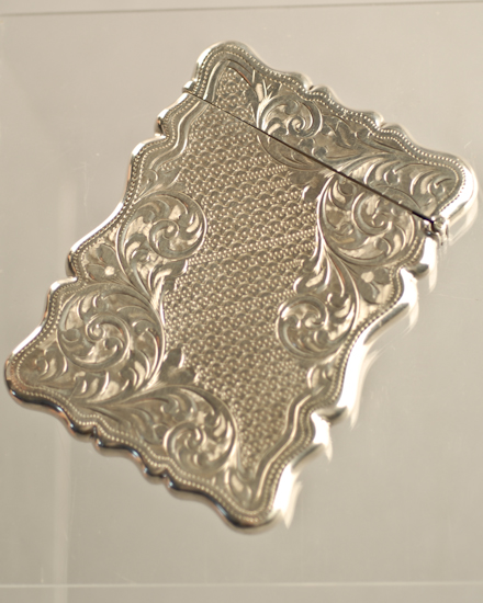 An English Sterling Card Case with shaped sides and allover