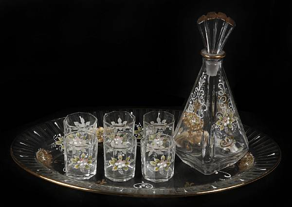 A Continental enamel and gilt heightened glass cordial set comprising