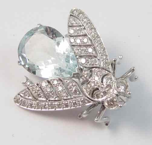 AQUAMARINE DIAMOND AND EIGHTEEN KARAT WHITE GOLD INSECT BROOCH the