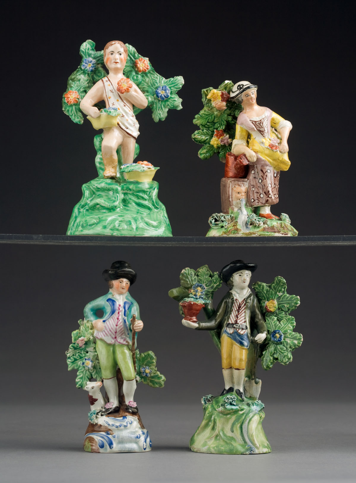 THREE STAFFORDSHIRE POTTERY BOCAGE FIGURES CIRCA 1815 30 Comprising a