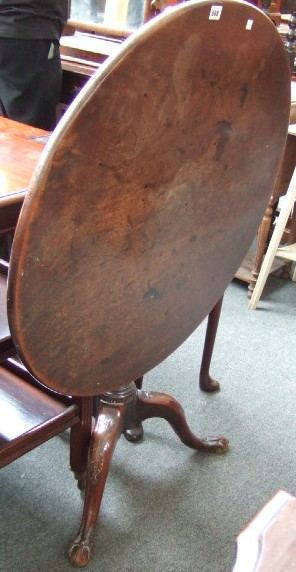 An 18th century and later mahogany occasional table the circular