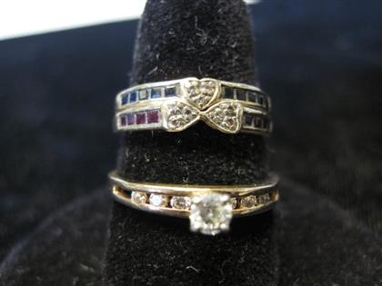 Group of six gem set band ringsConsisting of sapphire set