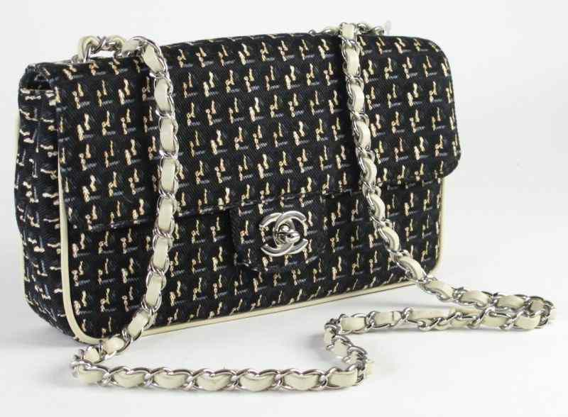 Canvas and Leather 2 55 Flap Bag Chaneldesigned as printed