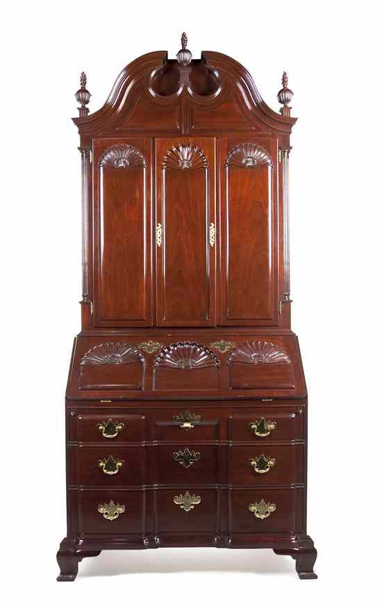 An American Mahogany Secretary Kindel having a broken arch pediment