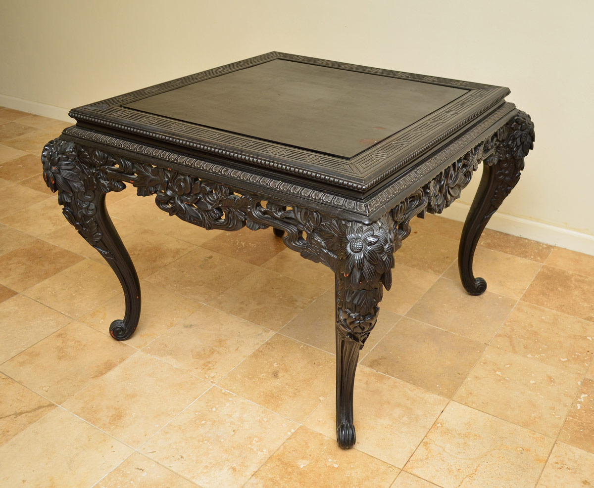 CARVED CHINESE CENTER TABLE Top framed with oriental geometric design