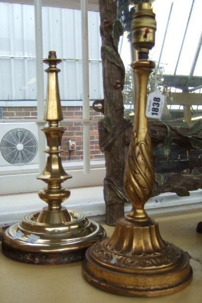 A Victorian gilt brass lamp base relief moulded with acanthus